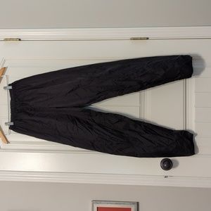 Body Wrappers trash bag pants, size small